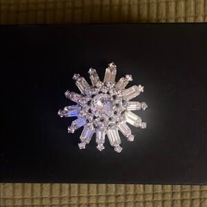 Radiant Silver Crystal Brooch Starburst Design